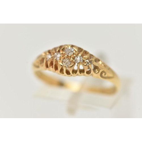 14 - AN 18CT GOLD DIAMOND BOAT RING, five old cut diamonds and one single cut diamond prong set in yellow... 