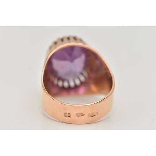 25 - A SYNTHETIC COLOUR CHANGE SAPPHIRE SIGNET RING, designed as an oval purple synthetic colour change s... 