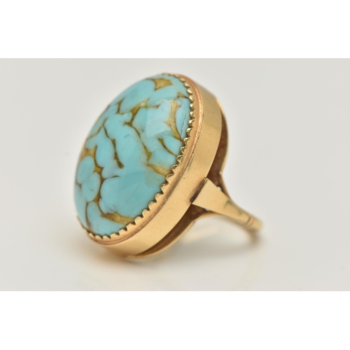 28 - A GLASS CABOCHON RING, designed as an oval glass turquoise imitation cabochon, stamped 18ct, approxi... 