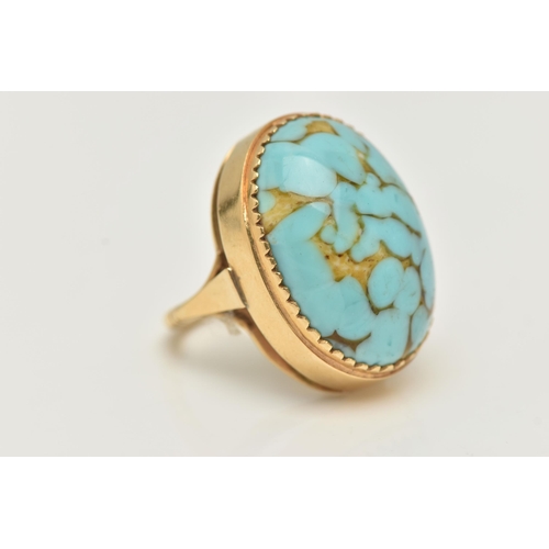 28 - A GLASS CABOCHON RING, designed as an oval glass turquoise imitation cabochon, stamped 18ct, approxi... 