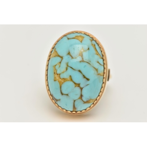 28 - A GLASS CABOCHON RING, designed as an oval glass turquoise imitation cabochon, stamped 18ct, approxi... 