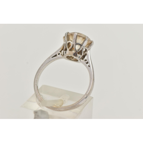 35 - A 9CT WHITE GOLD SINGLE STONE CUBIC ZIRCONIA RING, the circular cut cubic zirconia in an eight claw ... 