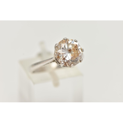 35 - A 9CT WHITE GOLD SINGLE STONE CUBIC ZIRCONIA RING, the circular cut cubic zirconia in an eight claw ... 