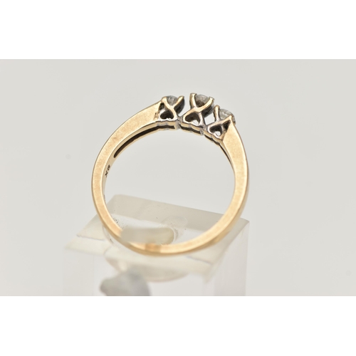 37 - TWO ITEMS OF JEWELLERY, to include a 9ct gold three stone diamond ring with diamond detail to the sh... 