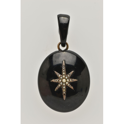 39 - A LATE VICTORIAN JET AND SEED PEARL PENDANT, of oval outline with central elongated star set with sp... 