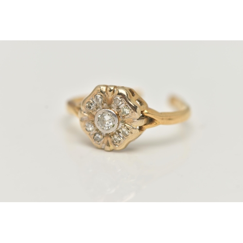 41 - A DIAMOND CLUSTER RING, AF, designed as a two tier cluster, the central brilliant cut diamond within... 