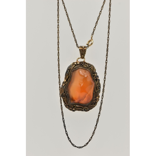 57 - A CONTINENTAL PENDANT, the Chinese style pendant designed as a polished agate within a floral and fo... 