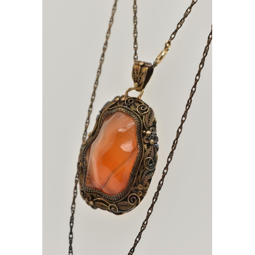 57 - A CONTINENTAL PENDANT, the Chinese style pendant designed as a polished agate within a floral and fo... 