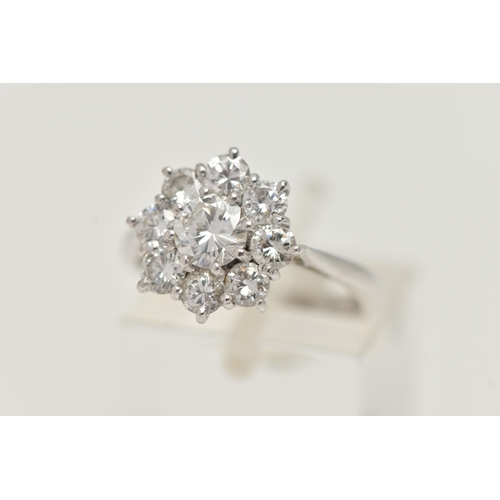 6 - AN 18CT GOLD DIAMOND CLUSTER RING, nine round brilliant diamonds, approximate total diamond weight 1... 