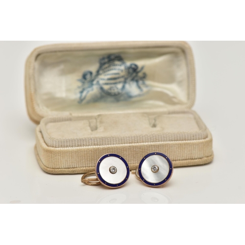 66 - A PAIR OF 9CT GOLD DIAMOND SET CUFFLINKS, each of a circular form, centrally set with a small round ... 