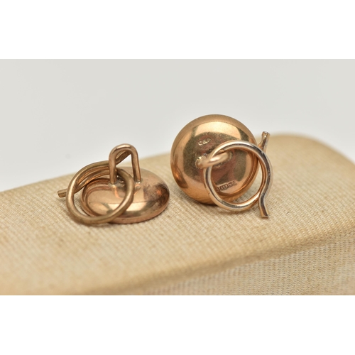 66 - A PAIR OF 9CT GOLD DIAMOND SET CUFFLINKS, each of a circular form, centrally set with a small round ... 