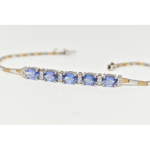 70 - A GEM SET BRACELET, comprised of five oval cut tanzanite interspaced with twelve round brilliant cut... 