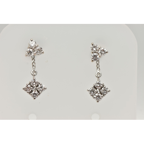 8 - A PAIR OF 18CT GOLD DIAMOND EARRINGS, a three stone round brilliant cut diamond cluster stud earring... 