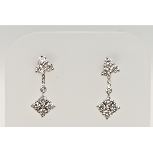 8 - A PAIR OF 18CT GOLD DIAMOND EARRINGS, a three stone round brilliant cut diamond cluster stud earring... 