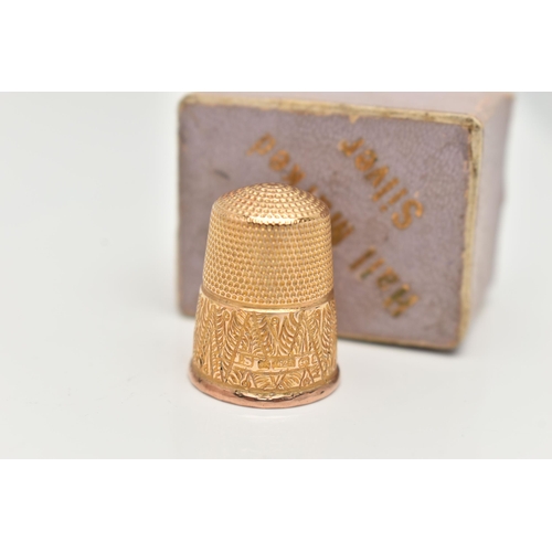 119 - A LATE VICTORIAN, 15CT GOLD THIMBLE, textured detail with a vacant shield cartouche, hallmarked Birm... 