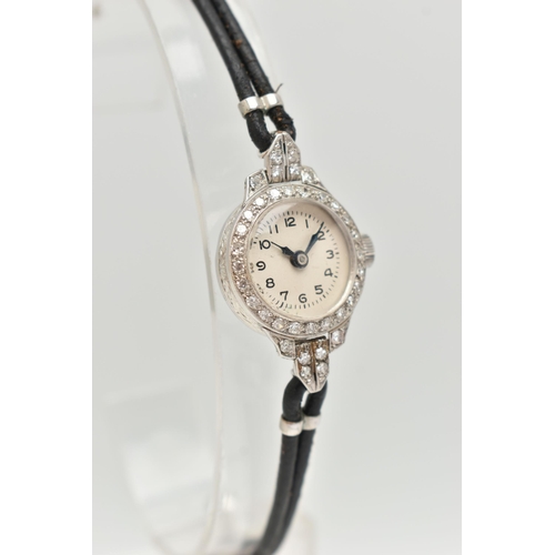 127 - A LADIES DIAMOND SET COCKTAIL WRISTWATCH, manual wind, round silvered dial, Arabic numerals, blue st... 