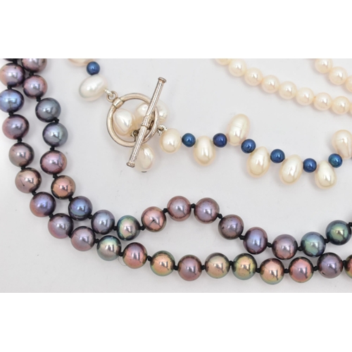 128 - THREE CULTURED PEARL NECKLACES, the first a single row of white cultured pearls with a pink hue, eac... 