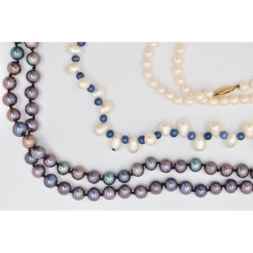 128 - THREE CULTURED PEARL NECKLACES, the first a single row of white cultured pearls with a pink hue, eac... 