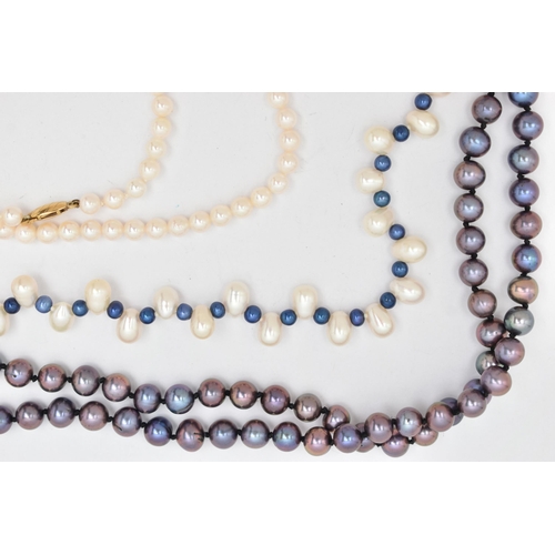 128 - THREE CULTURED PEARL NECKLACES, the first a single row of white cultured pearls with a pink hue, eac... 