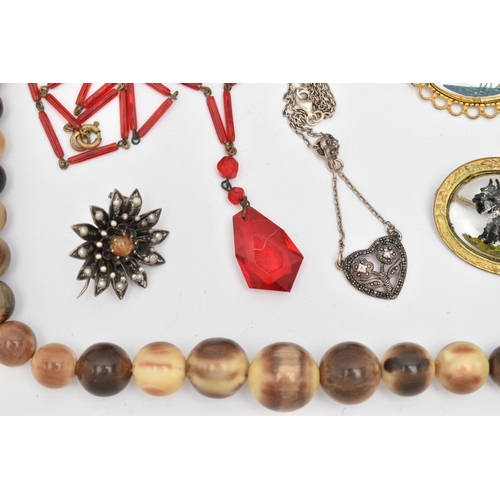 79 - SIX ITEMS OF JEWELLERY, to include a carved horn bead necklace with screw clasp, a red bead necklace... 