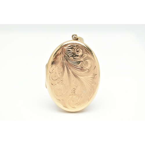 88 - A 9CT GOLD OVAL LOCKET PENDANT, floral pattern to the front, polished reverse, hallmarked 9ct Birmin... 