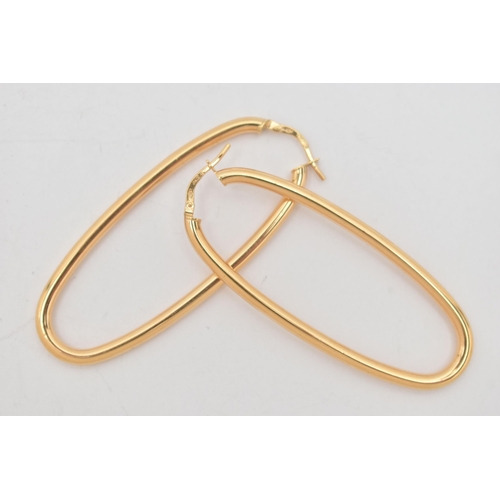 99 - A PAIR OF 9CT GOLD HOOP EARRINGS, large oval hollow hoops, length 58.6mm, width 23.2mm, lever fittin... 