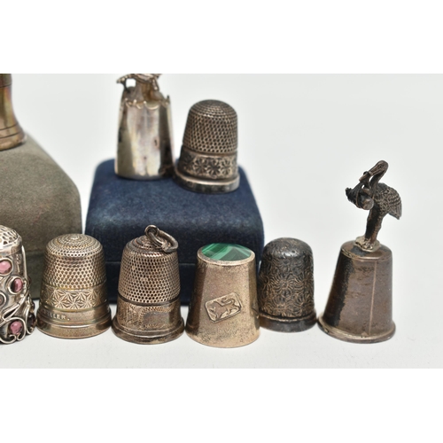 141 - A SELECTION OF SILVER THIMBLES, twenty-two thimbles and a silver tooth fairy trinket box, various de... 