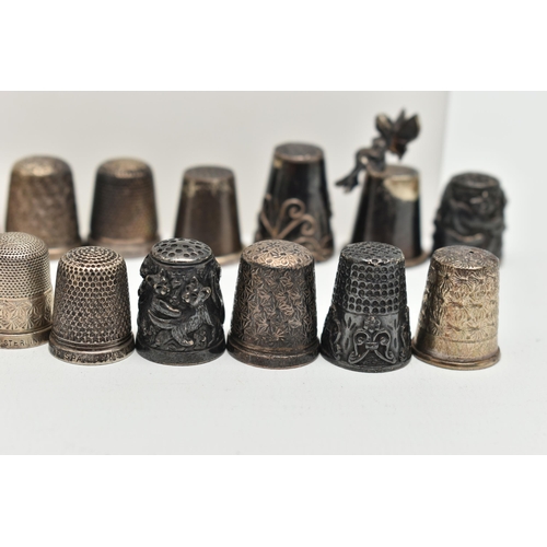 142 - A BAG OF WHITE METAL THIMBLES, various designs and patterns, some set with semi-precious stone termi... 