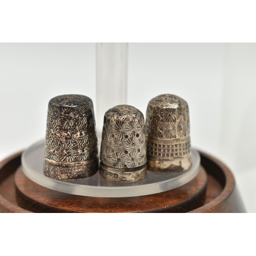 145 - TWELVE 'CHARLES HORNER' SILVER THIMBLES AND A DOMED GLASS DISPLAY CASE, all hallmarked 'Charles Horn... 