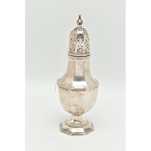 158 - A GEORGE V SILVER SUGAR CASTER, faceted form, pierced cover with pointed finial, on a weighted base,... 