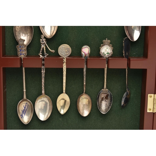 172 - A CASE OF ASSORTED SILVER AND WHITE METAL SPOONS, a selection of seven silver souvenir spoons and an... 