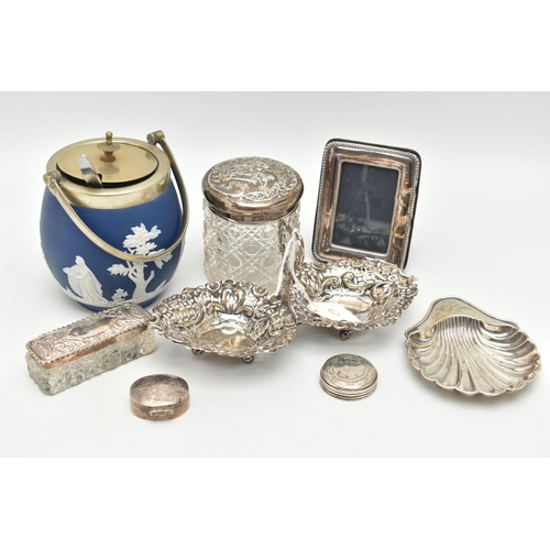 174 - A SMALL PARCEL OF VICTORIAN AND LATER SILVER, comprising a late Victorian silver repoussé bonbon dis... 