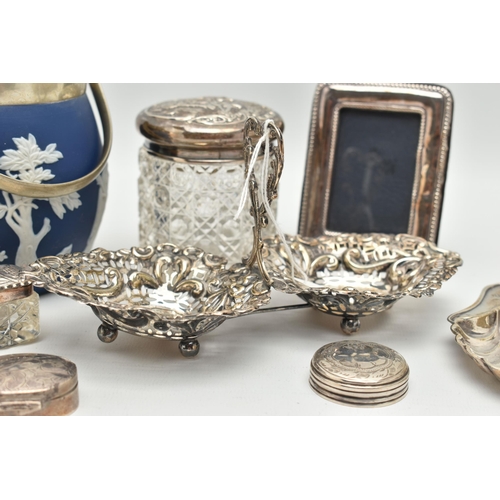 174 - A SMALL PARCEL OF VICTORIAN AND LATER SILVER, comprising a late Victorian silver repoussé bonbon dis... 