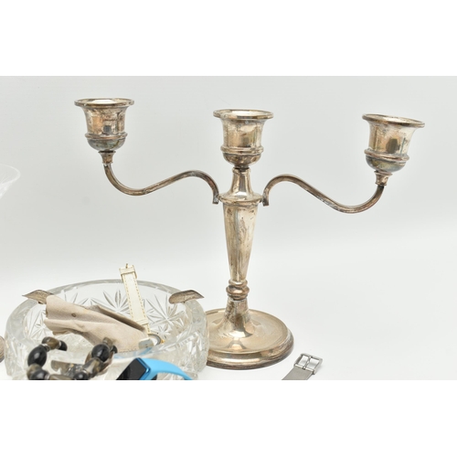 176 - A BOX OF ASSORTED SILVER AND GLASS WARE, to include a silver candle stick, two branches off a taperi... 