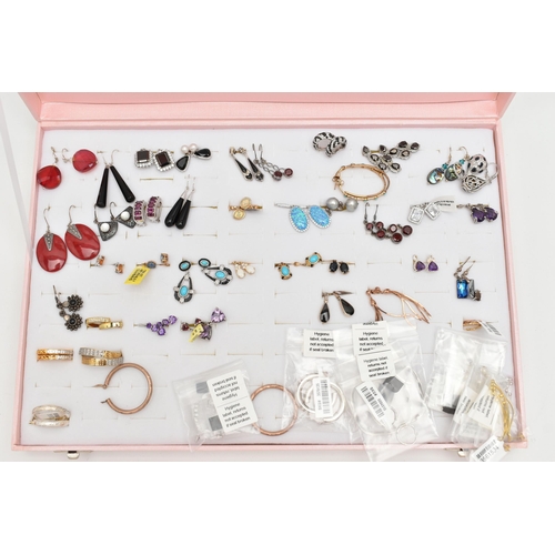 179 - A PINK JEWELLERY DISPLAY BOX WITH EARRINGS, forty eight pairs included, various designs, some pieces... 