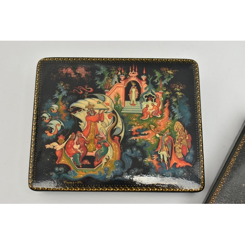 221 - TWO SECOND HALF 2OTH CENTURY RUSSIAN LACQUER BOXES OF RECTANGULAR FORM, hand painted figural scenes ... 