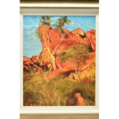 306 - ROLF HARRIS (AUSTRALIA 1930-2023) 'SUN ON DEVIL'S MARBLES', a limited edition print on  canvas board... 