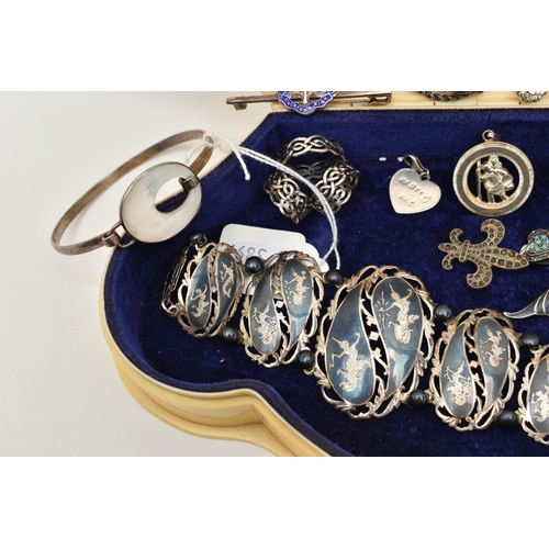 215 - A SELECTION OF SILVER AND WHITE METAL JEWELLERY, to include a Siam bracelet, brooch and pair of earr... 