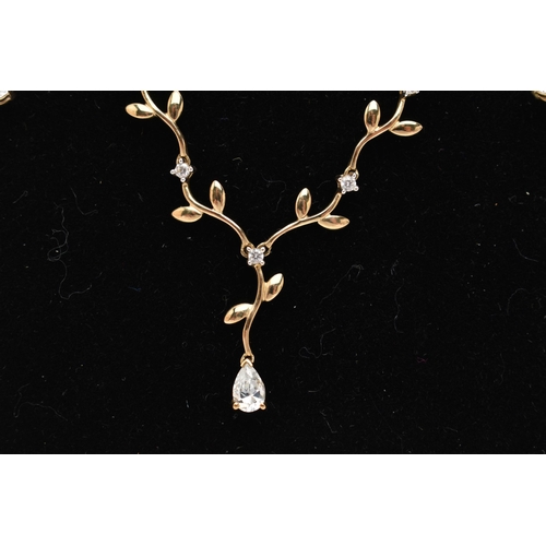 217 - A 9CT GOLD NECKLACE AND DROP EARRINGS, the necklace designed as a V-shape foliate line set with circ... 