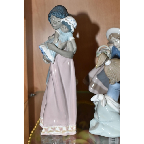 315 - FOUR LLADRO FIGURES, comprising Bashful Bather no 5455, sculptor Juan Huerta, issued 1988-, Sweet Sc... 