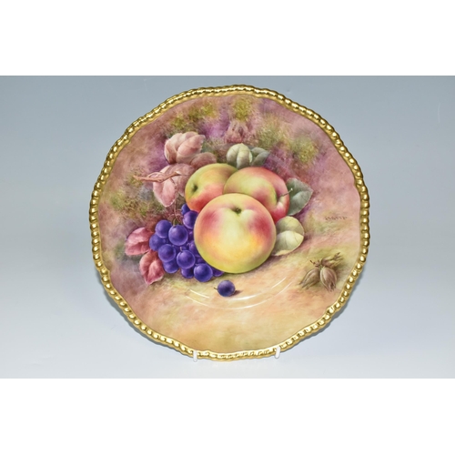 319 - A COALPORT HAND PAINTED CABINET PLATE, with gilt rim, hand painted with apples, grapes and hazel nut... 