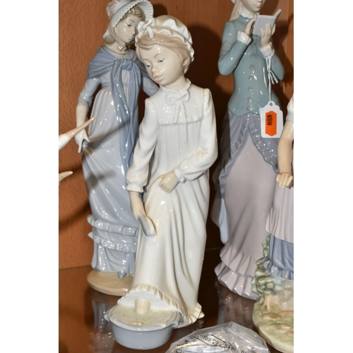 329 - FOUR LLADRO AND NAO FIGURES, comprising two Lladro figures: Reading no 5000, sculptor Francisco Cata... 