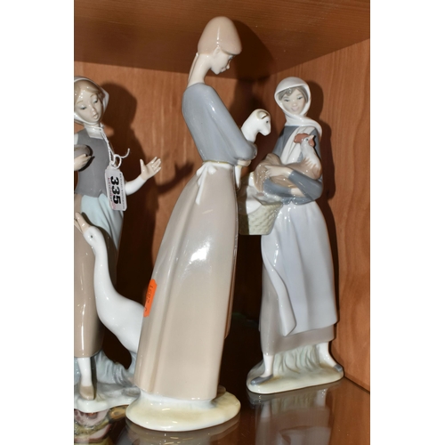 335 - A GROUP OF THREE LLADRO FIGURINES, comprising 4591 'Girl With a Cockerill', 4595 'Girl with Lamb' an... 