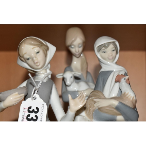 335 - A GROUP OF THREE LLADRO FIGURINES, comprising 4591 'Girl With a Cockerill', 4595 'Girl with Lamb' an... 