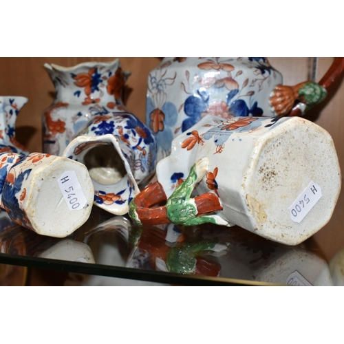 336 - A COLLECTION OF SIX 19TH CENTURY GRADUATIMG MASON'S IRONSTONE IMARI PATTERN 'HYDRA' JUGS, decorated ... 