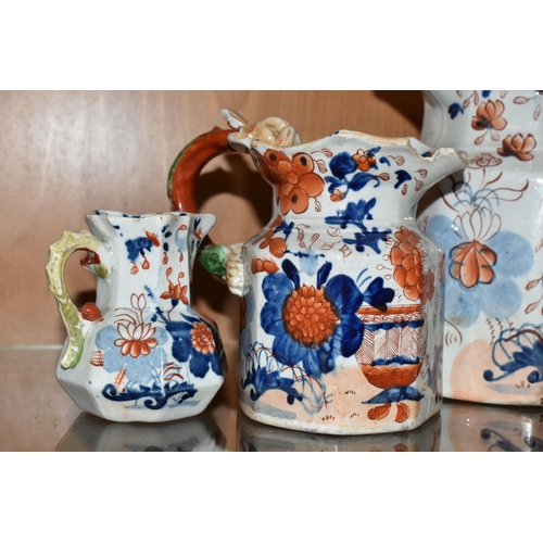 336 - A COLLECTION OF SIX 19TH CENTURY GRADUATIMG MASON'S IRONSTONE IMARI PATTERN 'HYDRA' JUGS, decorated ... 