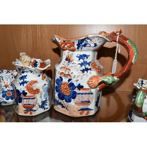 336 - A COLLECTION OF SIX 19TH CENTURY GRADUATIMG MASON'S IRONSTONE IMARI PATTERN 'HYDRA' JUGS, decorated ... 