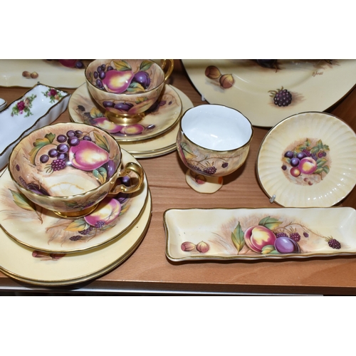 342 - A GROUP OF AYNSLEY 'ORCHARD GOLD' TEAWARE, comprising two tea cups (marked as second quality), two s... 