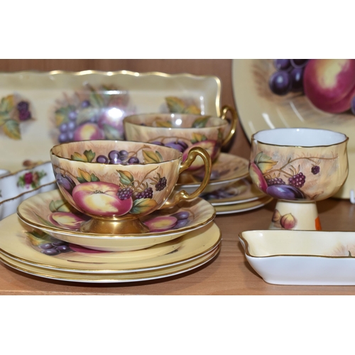 342 - A GROUP OF AYNSLEY 'ORCHARD GOLD' TEAWARE, comprising two tea cups (marked as second quality), two s... 