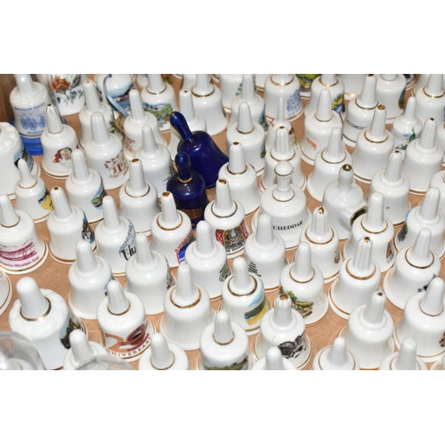 344 - THREE BOXES OF PORCELAIN BELL ORNAMENTS, over two hundred miniature holiday souvenir bells together ... 